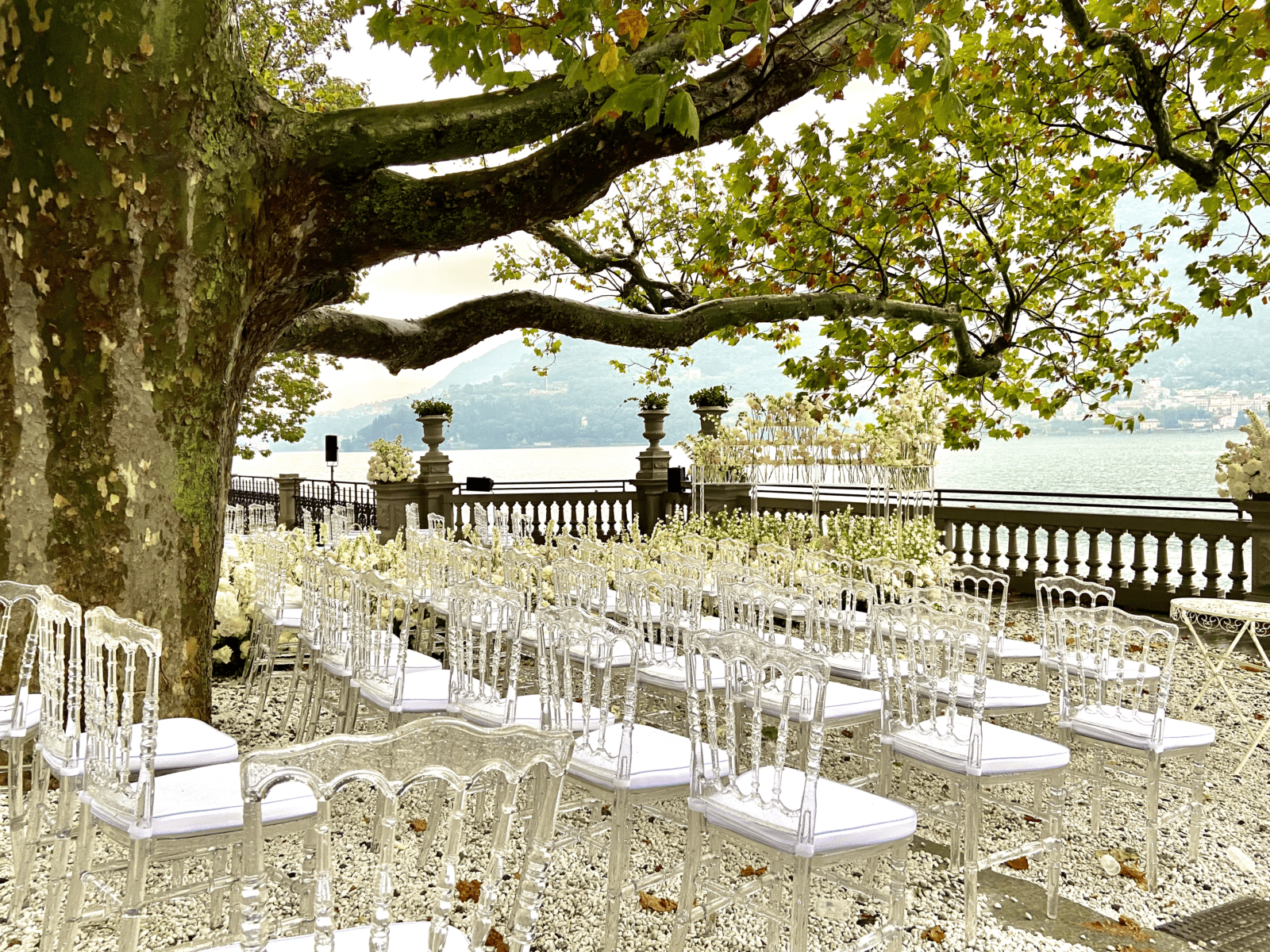 wedding in como is the best location to marry in Italy like Mandarin Oriental where all the chairs are prepared for the ceremony in the garden front lake